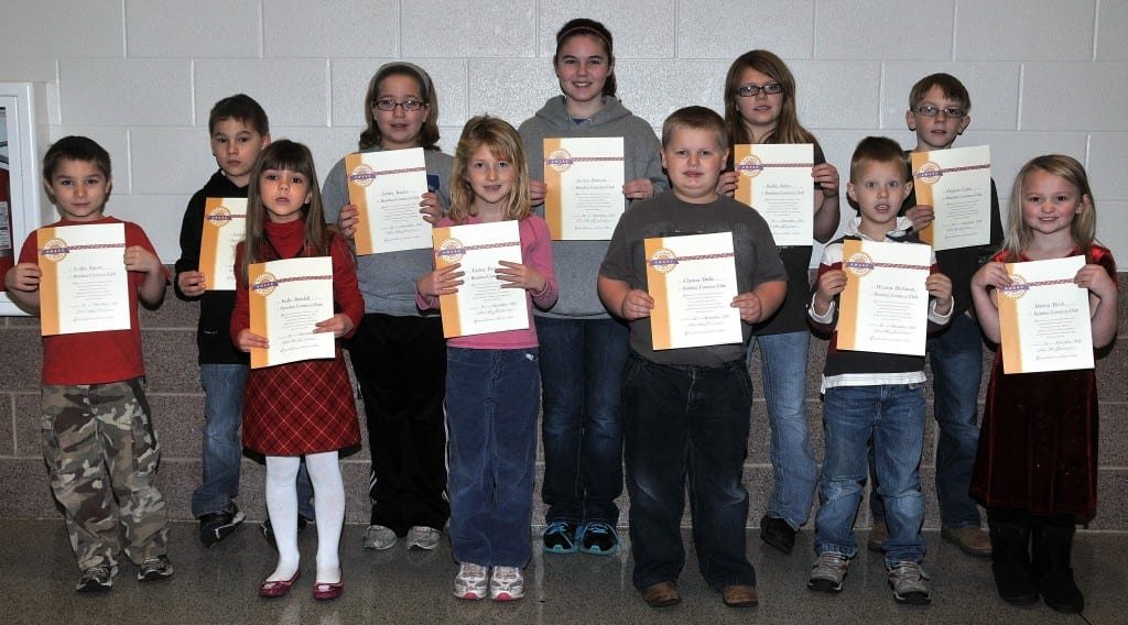 BOMBER COURTESY CLUB … Students at Edon Northwest Local Schools selected for membership into the Bomber Courtesy Club for December 2012 were, front row, from left, Collin Sprow, Kally Randall Taylor Pack, Clayton Dulle, Westen Hickman, Darion Deck and back row, Zack Sprow, Ashley Kaylor, Jordan Runyan, Karlie Scher and Dayton Cope. Not pictured ~ Derango Sheets. Each student received a special certificate and coupons good for a cookie and ice cream treat from the schools cafeteria.