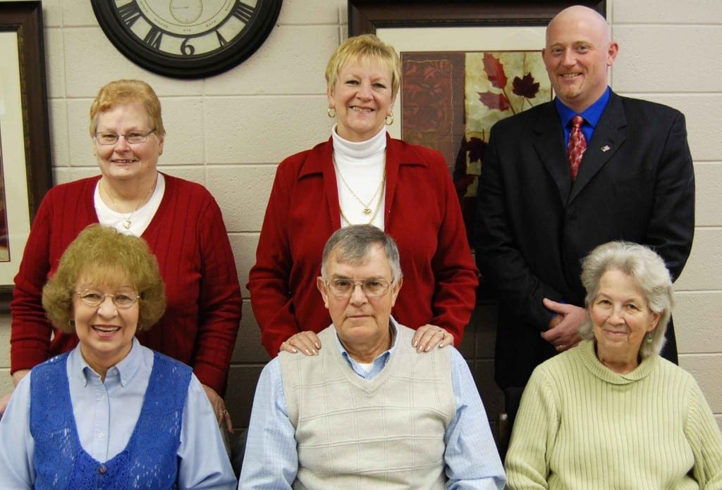 The Quadco Administrative Board reorganized for 2013 prior to their regular meeting on January 22 and retained their officers from the previous year. Barb Heer of Stryker will serve again as President, Jean Lightle-Jackman of Defiance will continue as Vice President and Gary Burr of Bryan remains the Secretary. Board members shown in the photo seated from left to right are Jean Lightle Jackman, Tom Eggers of Ridgeville Corners, and Barb Heer. Standing from left to right are Ruth Ann Osborn of Bryan, Tootie Bockelman of Napoleon and Gary Burr. Herb Gurwell from Delta and Barbara Grant from Sherwood are missing from the photo.