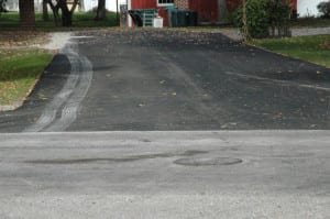 BRINGING THE DEAD END BACK TO LIFE ... Efforts to work towards the continuous improvement of the village of West Unity recently included the paving of the north end of Jefferson Street where it dead ends, along with a portion of a driveway that had settle after the water line replacement in the summer of 2012.