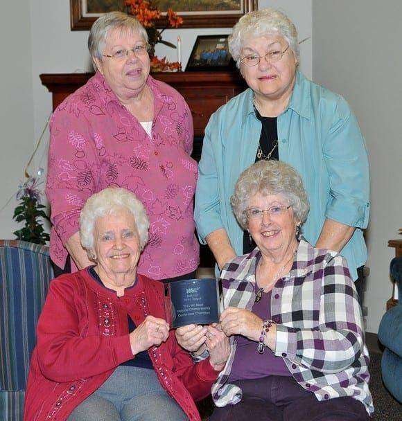 PHYSCO LADIES … Members of the 2013 Conference-winning team are from left, seated, Carol Brumbaugh, Marsha Snyder and standing, Anita Taylor, Judy White.